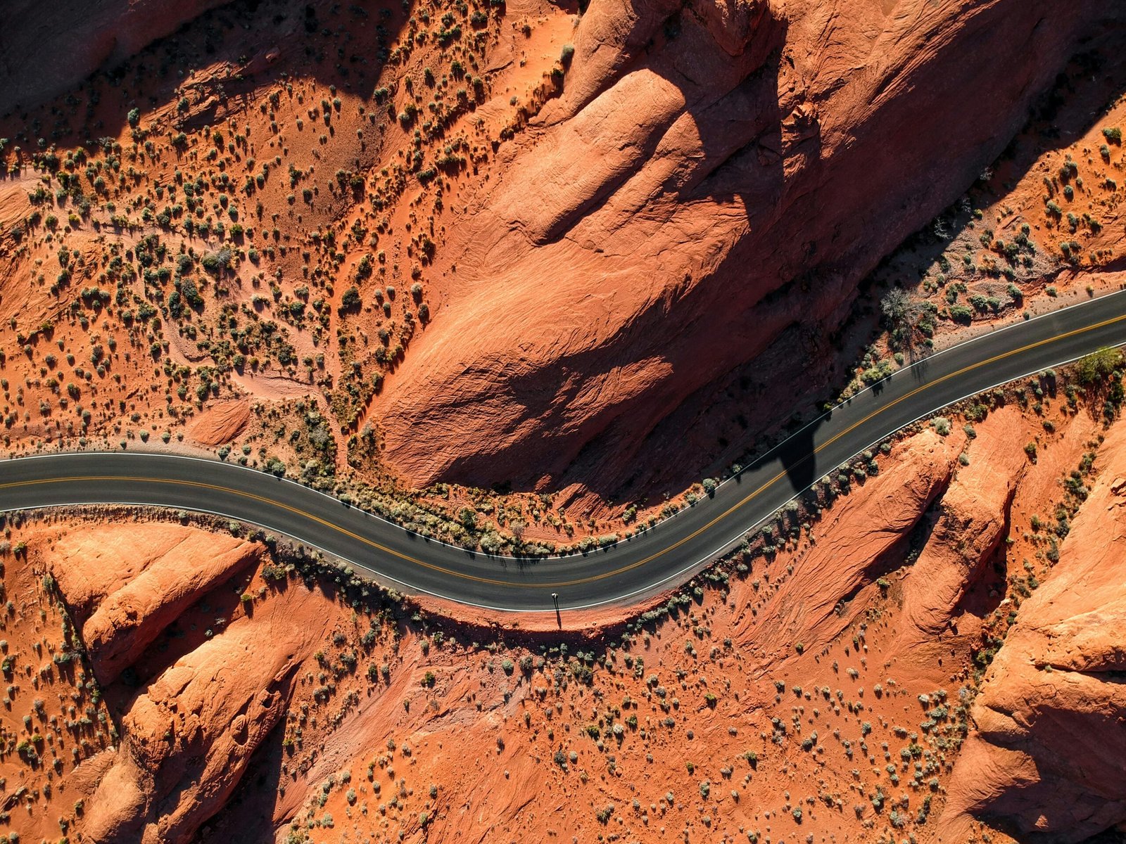 Open highway through desert landscape symbolizing road trip films and cinematic travel